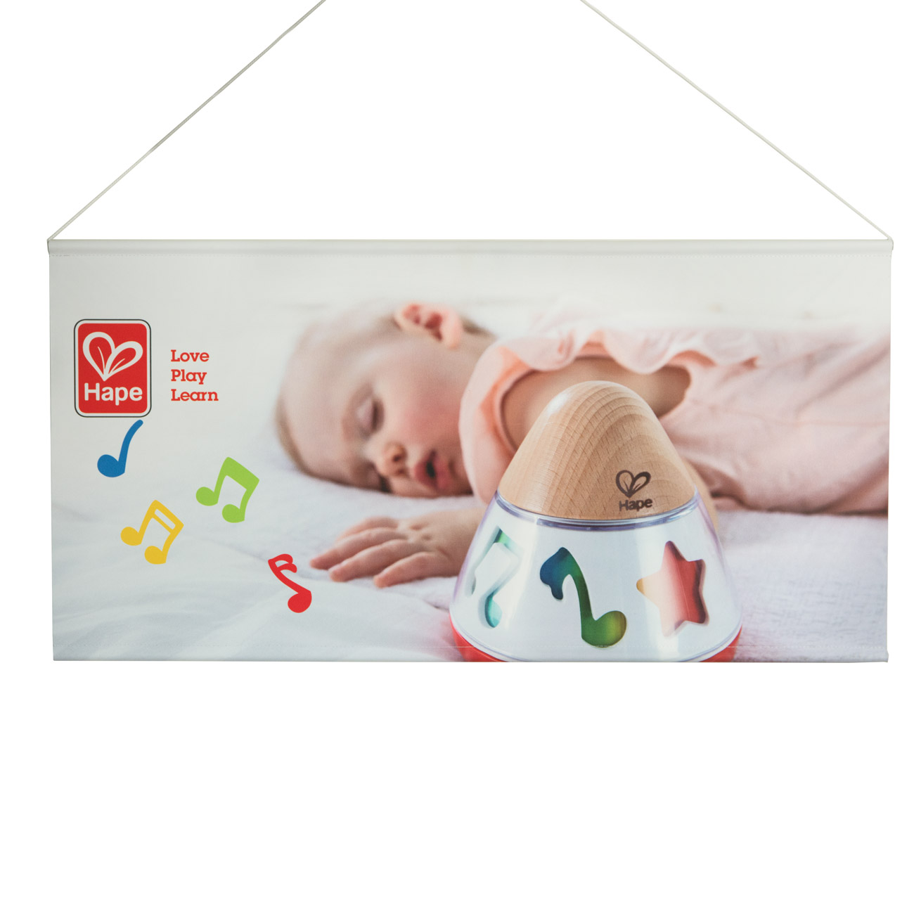 Pendaglio a soffitto in Velum Tex Blockout stampabile su entrambi i lati con motivo baby - esempio di applicazione per l’uso in ambienti interni